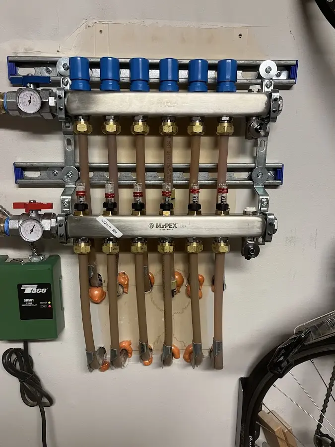 Plumber performing Water Heater Repair at a residential property in Dayton